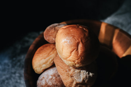 Homemade sourdough and bread bun. Freshly baked bread. Organic whole-wheat loaves. Simple breakfast...