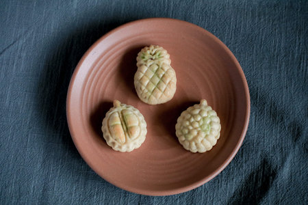 Taiwanese Pineapple Cakes, famous sweet delicious dessert food with tea, close up, copy space...