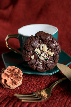 Chocolate Christmas Cookies with walnuts and chocolate chips on the table. Horizontal, biscuits...