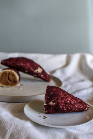 Baked sweet potato, made from mochi bread with Purple Sweet Potato inside. Food photography concept...