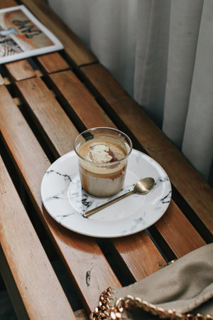 Affogato with Ice Cream. Italian coffee-based dessert with vanilla ice cream topped with a shot of hot espresso.の写真素材