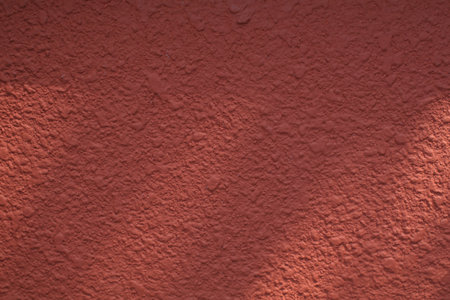 Orange or red Concrete Wall with sunlight and shadow Texture Background. Minimal summer travel backgroundの写真素材