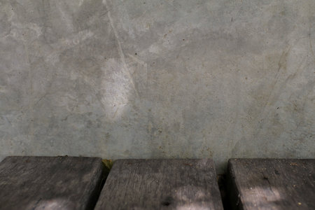 Wooden table on cement gray wall. Grunge Background Wallpaper Wood Floor Concrete Concept. Eco, Cosmetic, spa, beauty.の写真素材