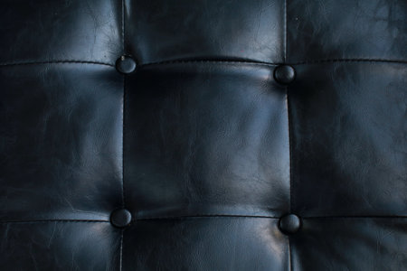Black leather texture and background in soft light. Interior decoration. Sofa and furniture decorative. Style vintage designの写真素材