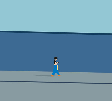 Young woman texting massage on her phone while walking down city street with blue wall background. Teenage lifestyle concept.のイラスト素材