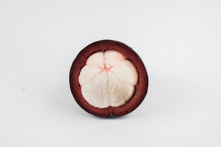 Mangosteen fruit on old white background. The Queen of Fruits, Tropical fruit with sweet juicy white segmentsの写真素材
