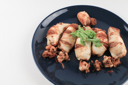 Deep Fried squid with garlic on white table eat with jasmin rice. Asian Thai food. seafood menu.の写真素材