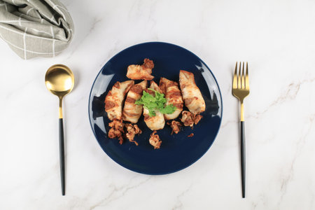 Deep Fried squid with garlic on white table eat with jasmin rice. Asian Thai food. seafood menu.の写真素材