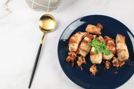 Deep Fried squid with garlic on white table eat with jasmin rice. Asian Thai food. seafood menu.の写真素材