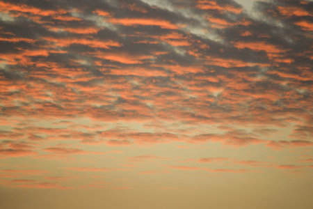 Majestic sunrise sky with colorful clouds. Abstract nature background. Peaceful morning outdoor...