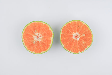 Fresh orange fruit with sliced on white background. Fresh summer fruit high vitamin C. Refresh...
