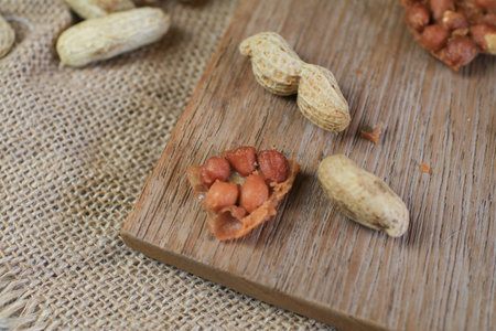 Boil nut with Thai Fried Peanut Cookies on dark background. Deep Fried Bean cookies peanut crackers...
