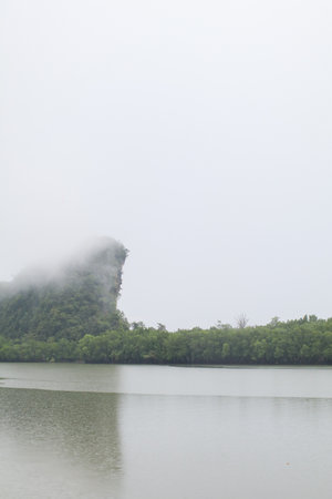 Khao Khanab Nam mountains and mangrove forest in the background symbol of Krabi province, Thailand.の写真素材