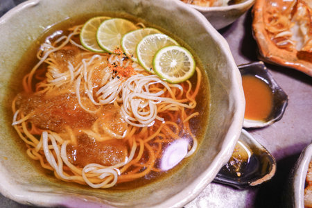 Cold Lemon Ramen or lime somen, Japanese wheat noodles with sliced â€‹â€‹citrus fruit in...