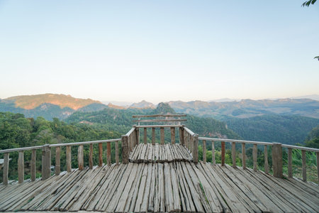Wooden terrace Tourism and travel viewpoint. Mountain range Amazing nature scenery landscape.の写真素材