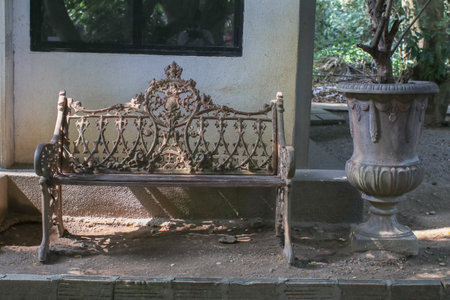 abandon, rustic, metal, bench, bath, sunlight, shadow, garden, design, outdoor, lifestyle, vintage, old, weathered, rusty, antique, forgotten, neglected, texture, decay, light, dark, summer, park, nature, furniture, seat, relax, empty, isolated, grungy, detail, close-up, contrast, background, scenery, peaceful, still, tranquil, backyard, yard, home, exterior, decorative, architecture, artistic, dreamy, moodの写真素材