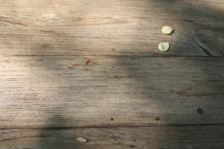 Wooden board, summer table background with empty space for text or design, minimalist and modern style.の写真素材
