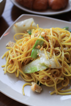 Stir fried yellow noodles with vegetable, classic of Chinese food. Vegetarian festival Asian cuisine.の写真素材