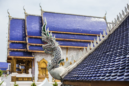 Thai art on roof Church at Thai templeの写真素材