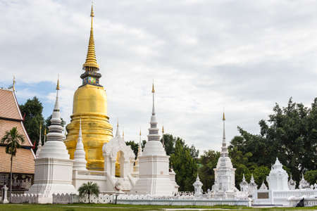 The golden pagoda at Wat Suan Dok, Chiangmai, Thailand.の写真素材