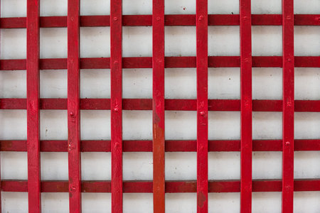 painted old wooden wall. red background.の写真素材