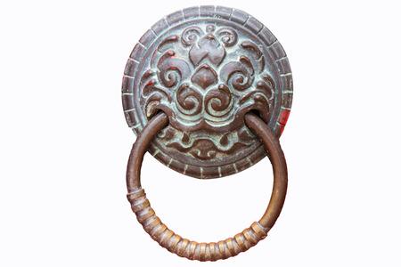 holder for door knocker and copper nails on a red door.の写真素材