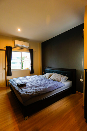 panoramic view of nice cozy bedroom.のeditorial素材