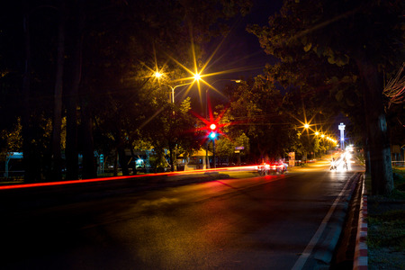 Long exposure photo of light trails on the street in Thailand.の写真素材