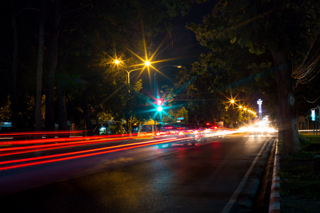Long exposure photo of light trails on the street in Thailand.の写真素材