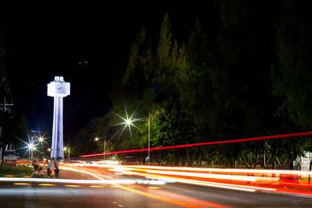Long exposure photo of light trails on the street in Thailand.の写真素材