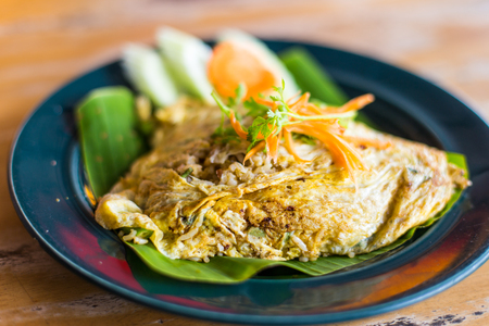 Green Curry Rice In Egg Wrapの写真素材
