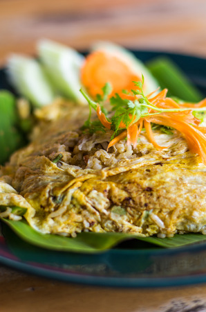 Green Curry Rice In Egg Wrapの写真素材