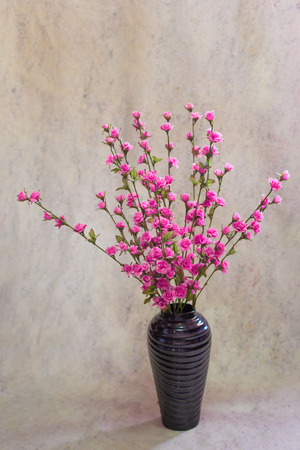 still life bogus flowers on painting background selected focus.の写真素材