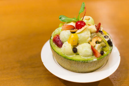 Fresh Fruit Salad in Melon Bowl.の写真素材