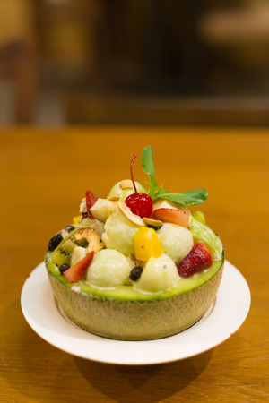 Fresh Fruit Salad in Melon Bowl.の写真素材