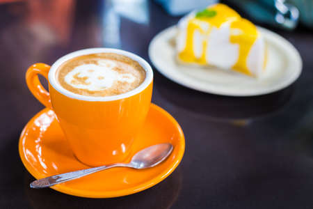 Coffee cup on wooden table - Vintage effect style pictures.の写真素材