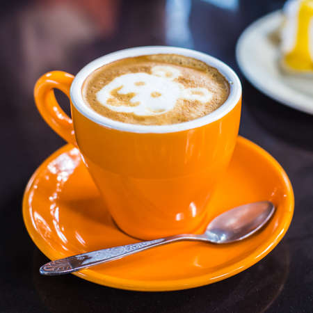 Coffee cup on wooden table - Vintage effect style pictures.の写真素材