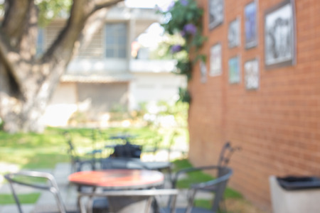 Table over outdoor restaurant blur background.の写真素材