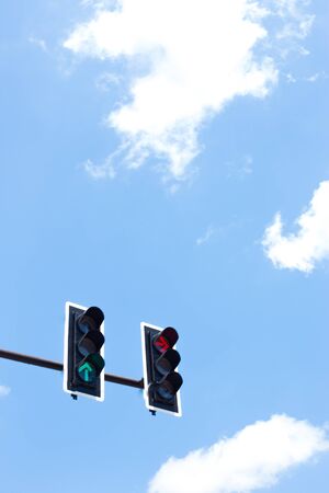 Traffic lights on blue sky background.の写真素材