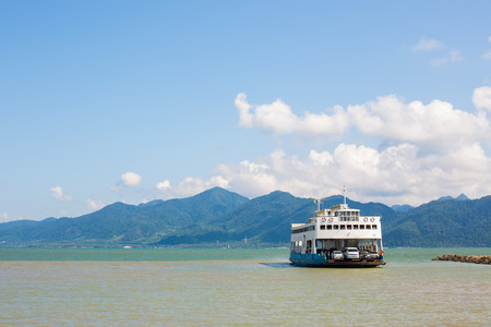 The cruise white liner sailing on the sea.の写真素材