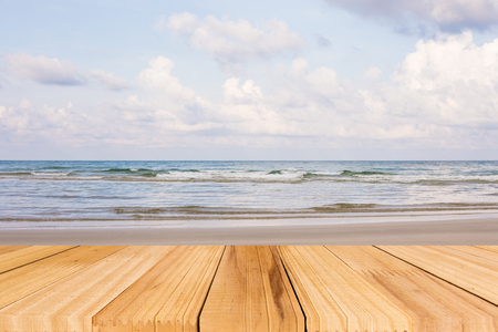 Selected focus Empty wooden deck table over sea background.の写真素材