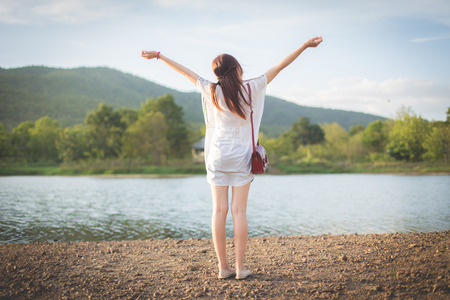 Outdoor portrait of a beautiful asian girl vintage and retro tone, soft focus.の写真素材
