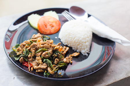 Rice and Pork fried with holy basil, Thai style food.の写真素材