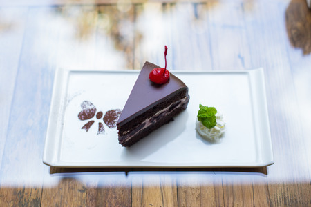 chocolate cake with blueberry cream and dark cocoa icing.の写真素材