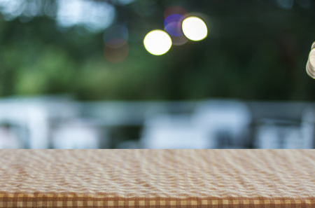 checkered table cloth on empty table and restaurant or cafe for Your photomontage or product display.の写真素材