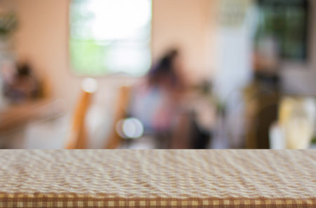 Checkered table cloth on empty table for Your photomontage or product display.