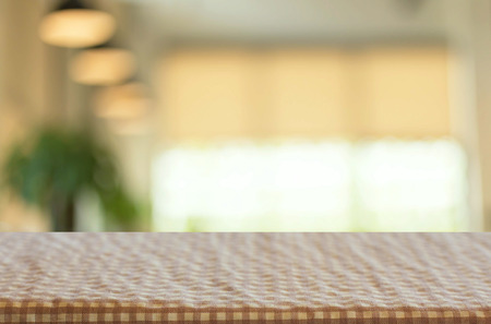 Checkered table cloth on empty table for Your photomontage or product display.の写真素材