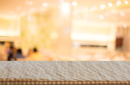 Checkered table cloth on empty table for Your photomontage or product display.の写真素材