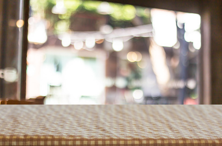 Checkered table cloth on empty table for Your photomontage or product display.の写真素材