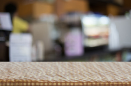 Checkered table cloth on empty table for Your photomontage or product displayの写真素材